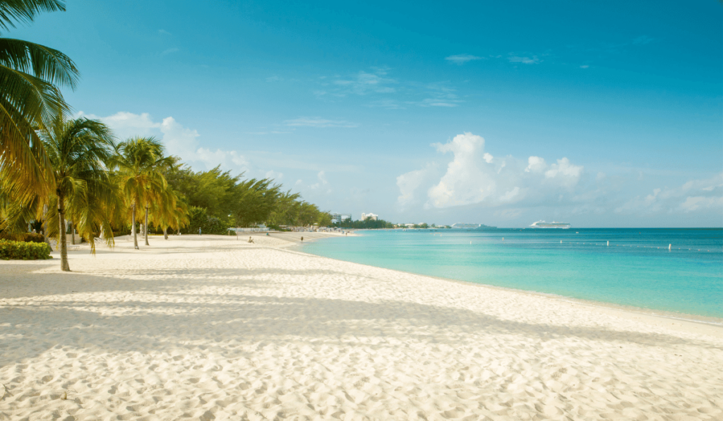 Seven Mile Beach - A world-renowned beach with clear waters and white sands.